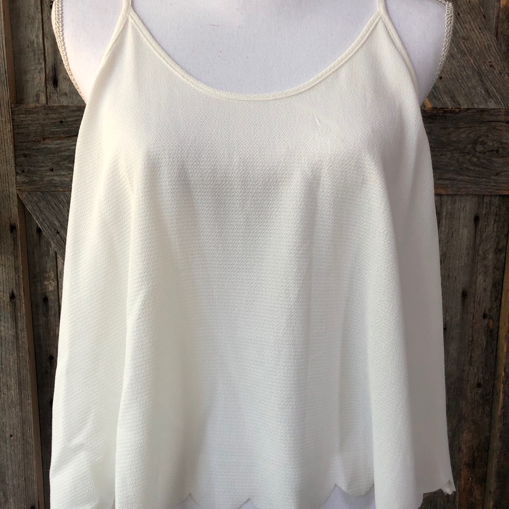 White scalloped top